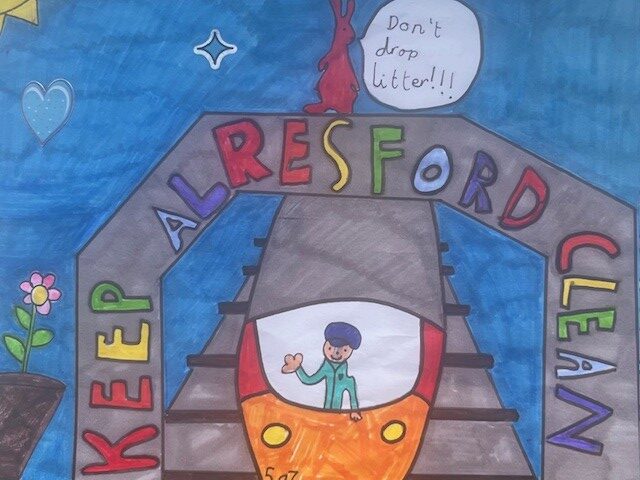 Children's artwork depicting a train with the message 'don't drop litter' and 'keep Alresford clean'.